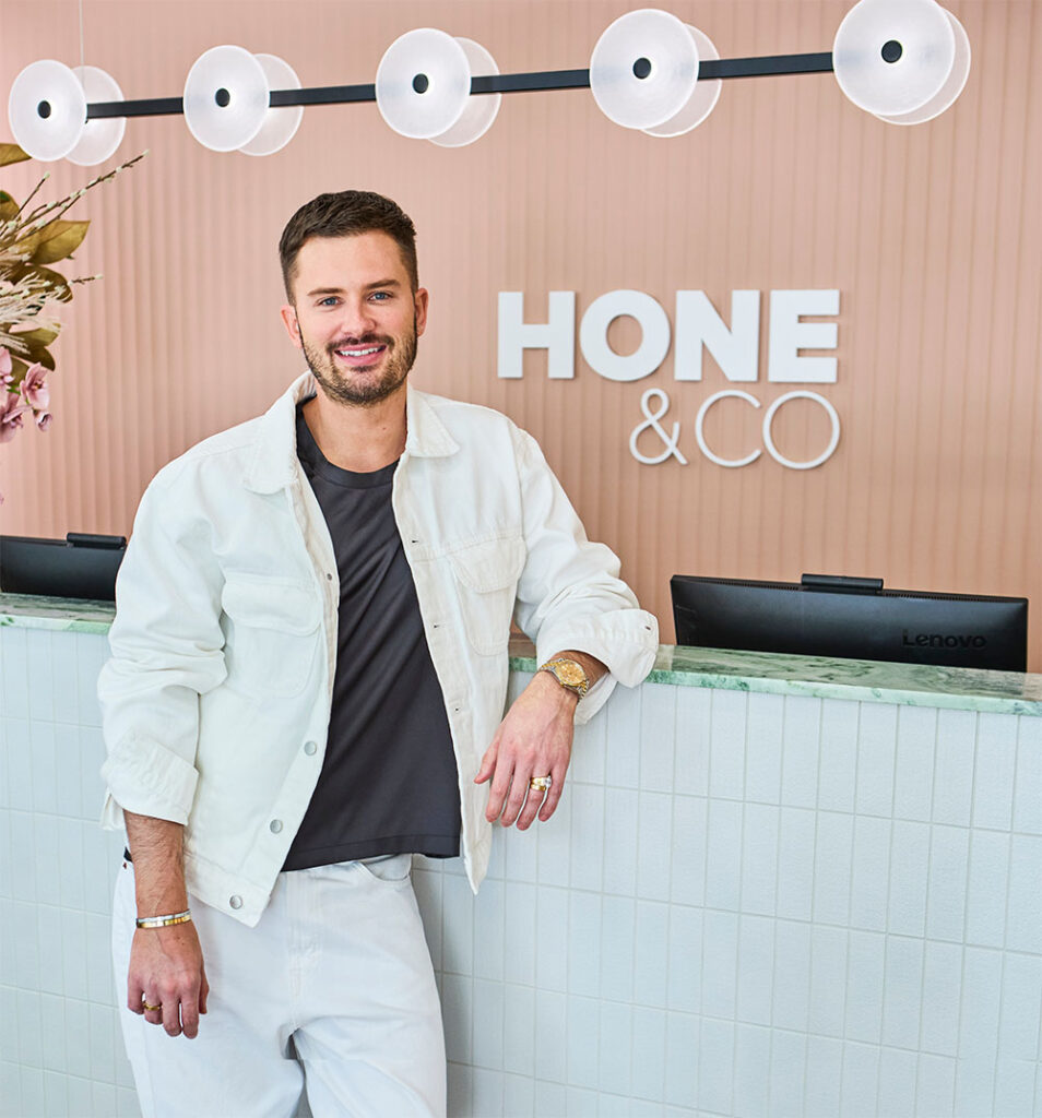 Jordan at HONE&Co salon front desk in North Sydney – best salon for expert haircuts and hairstyle trends