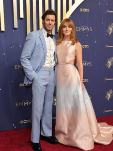 Leighton Meester on the 2025 Emmys red carpet showcasing her signature soft copper-red hair in a sleek, polished blowout — a modern and dimensional take on classic red tones, styled by expert colourists in North Sydney.